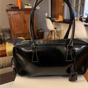 Prada Lacquered Leather classic handbag.